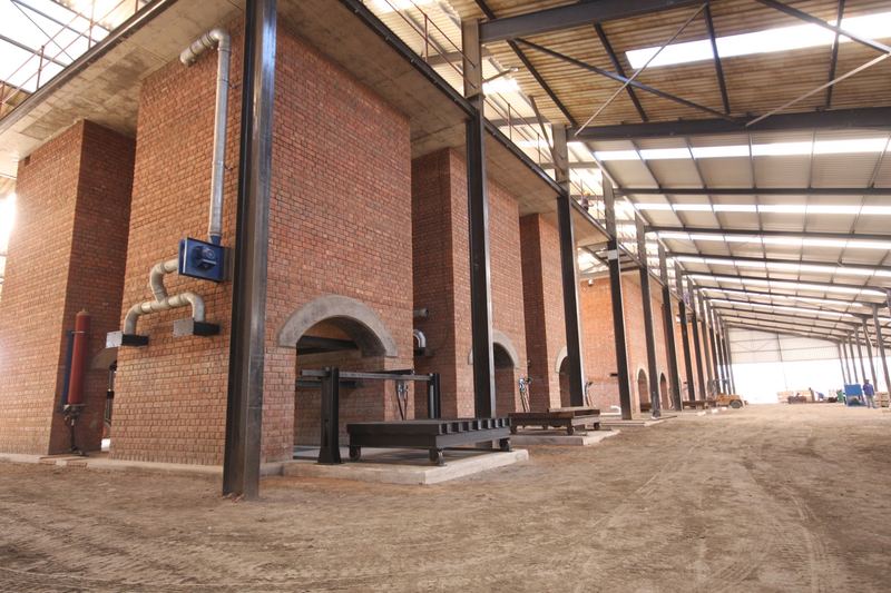 Completed kiln hall with brick kiln shafts