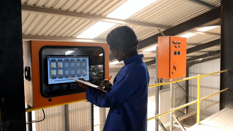 Operator using the SCADA touch screen